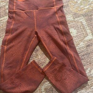 Lululemon Red orange Leggings size 8 (25”) with pockets crackle glaze